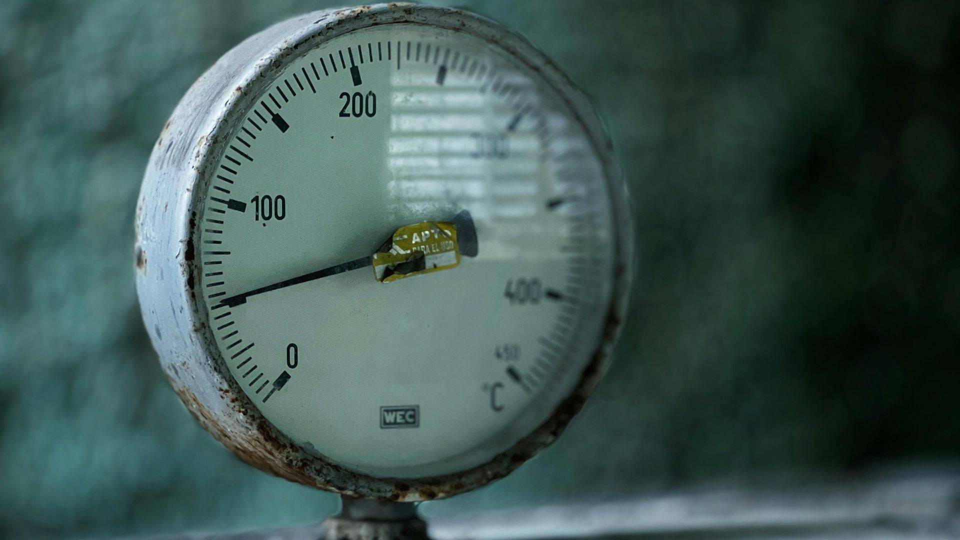 Project pressure gauge showing rising pressure levels in engineering environment